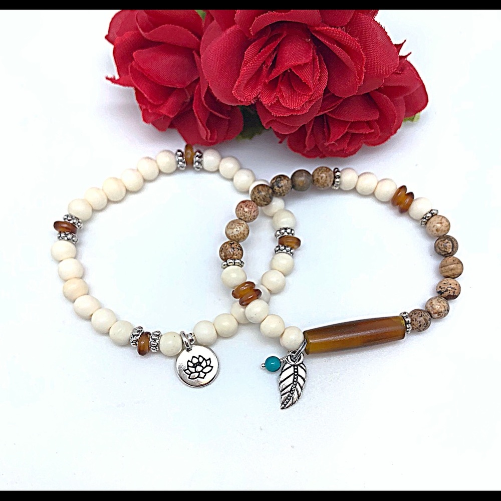 Pair of Bone & Horn Lotus and Leaf Lds Stretchys